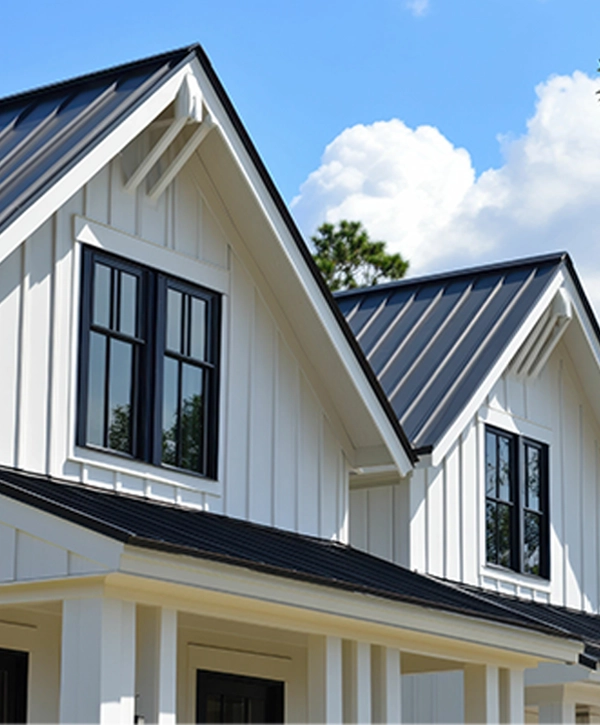 White Board And Batten. Omaha, NE House with Peak Roof and Black Trims