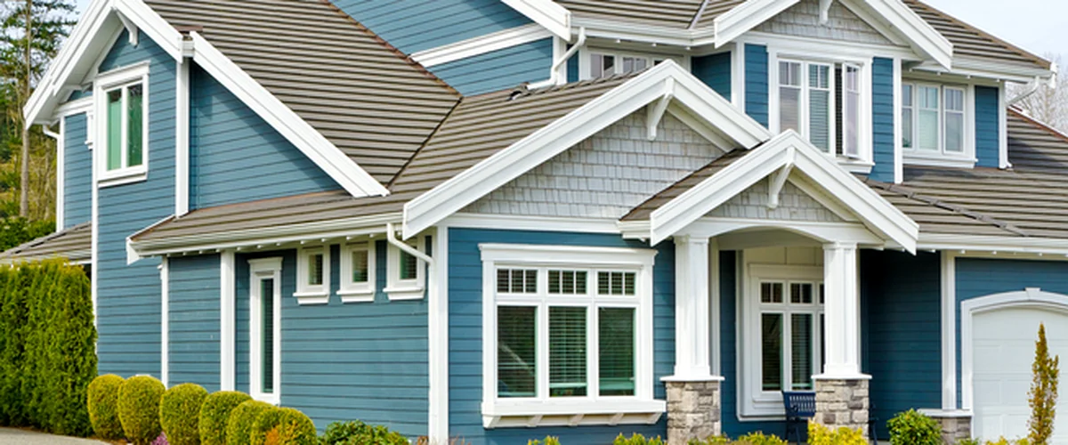 siding installation elkhorn ne siding modern blue house with professional siding white trim and landscaped yard