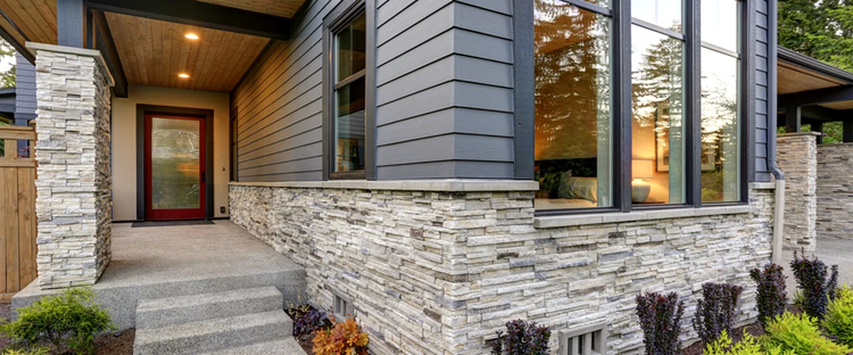 siding installation elkhorn ne siding modern home exterior with gray horizontal siding stone veneer accents and large windows