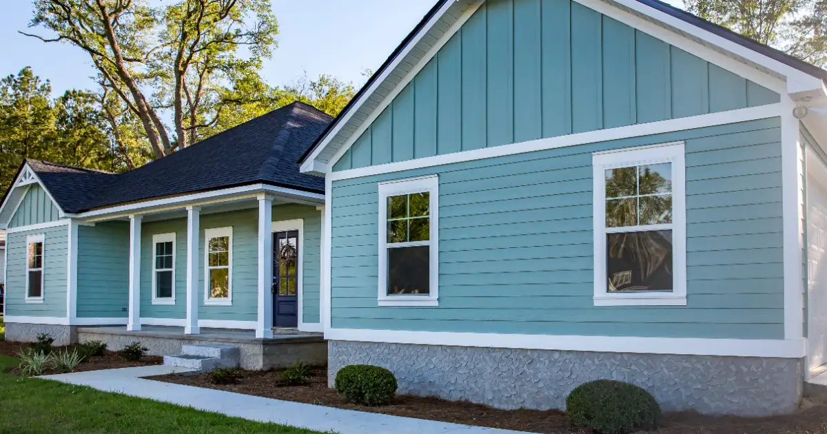 a house with light blue siding